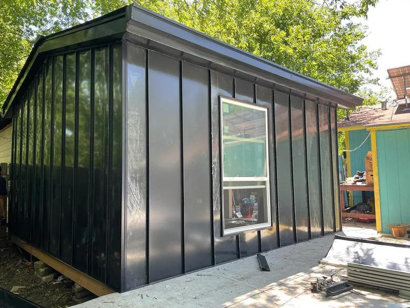 Black standing seam metal wall panels for Roof Inspection in Marianna